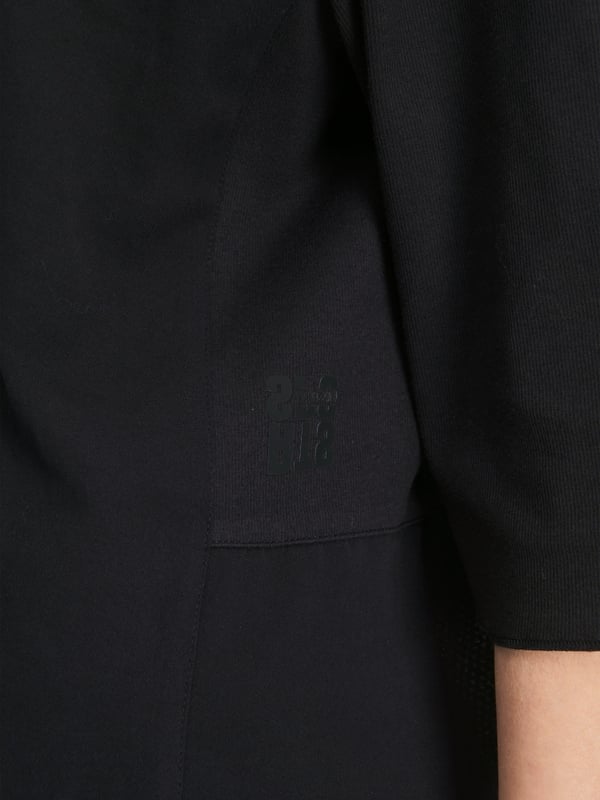 Marc Cain Raglanbluse mit Rüschendetail Bestseller
