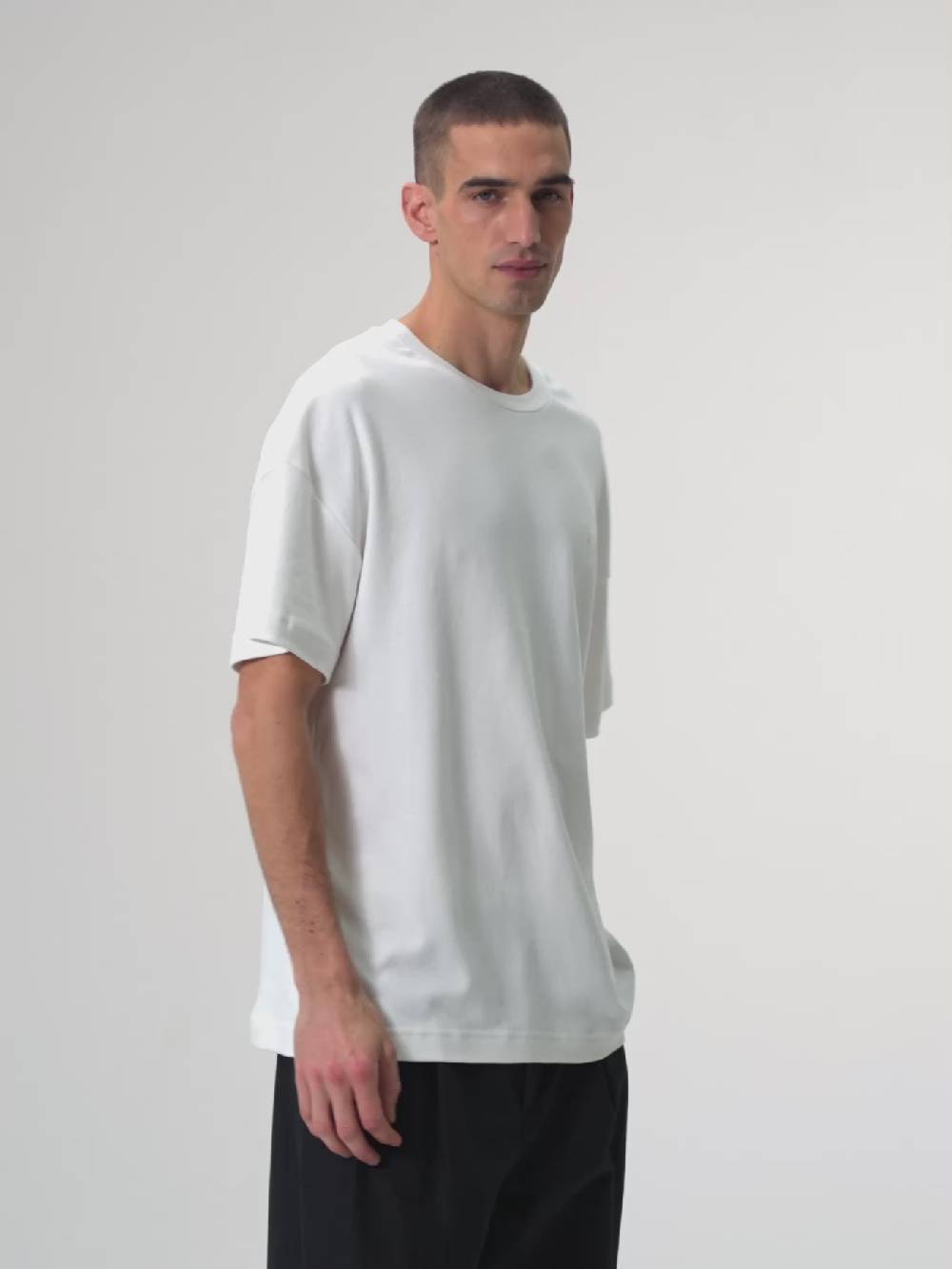 Pinqponq T-Shirt - Dandelion White (Unisex) Zeitlich begrenztes Angebot