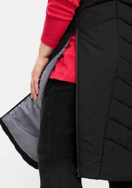 sheego Lange Steppweste mit Kapuze und seitlichen Zippern - schwarz sheego Zeitbegrenzte Promotion