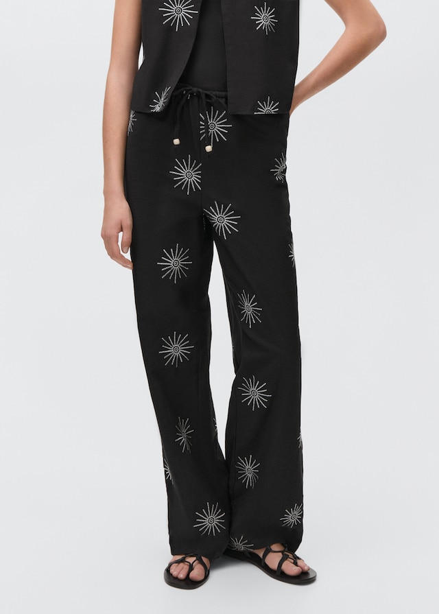 Mango Lange Hose mit Stickdetails Verkauf